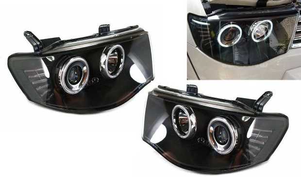 Фара MITSUBISHI L200 / TRITON 05- черные тюнинг комплект лев.+прав. <b>EAGLE EYES PF-EE-D14-1102P-LDEM8</b> - изображение 1